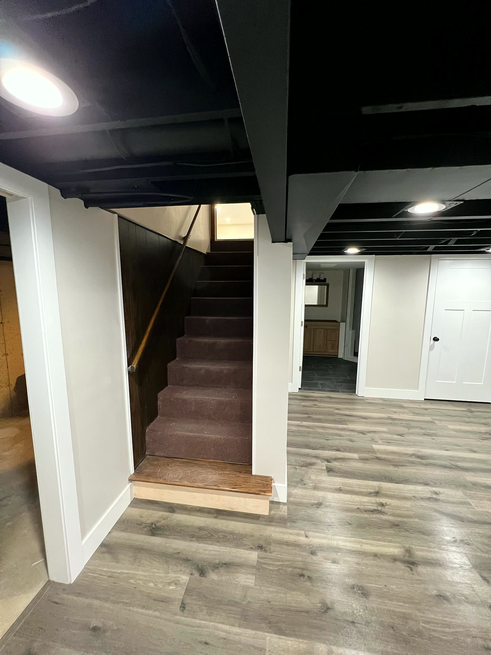 Finished stairs and landing with tile flooring