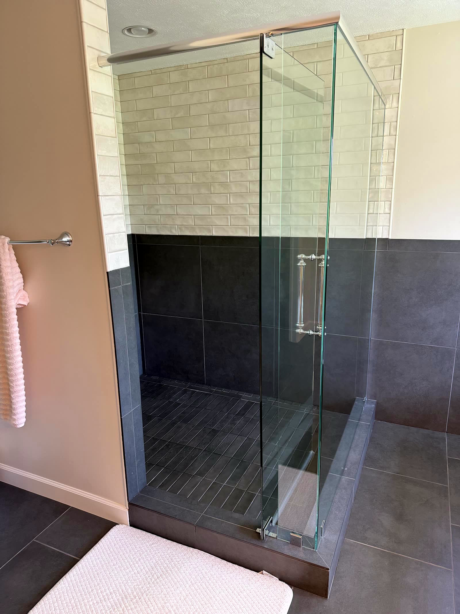 Frameless glass walk-in tiled shower