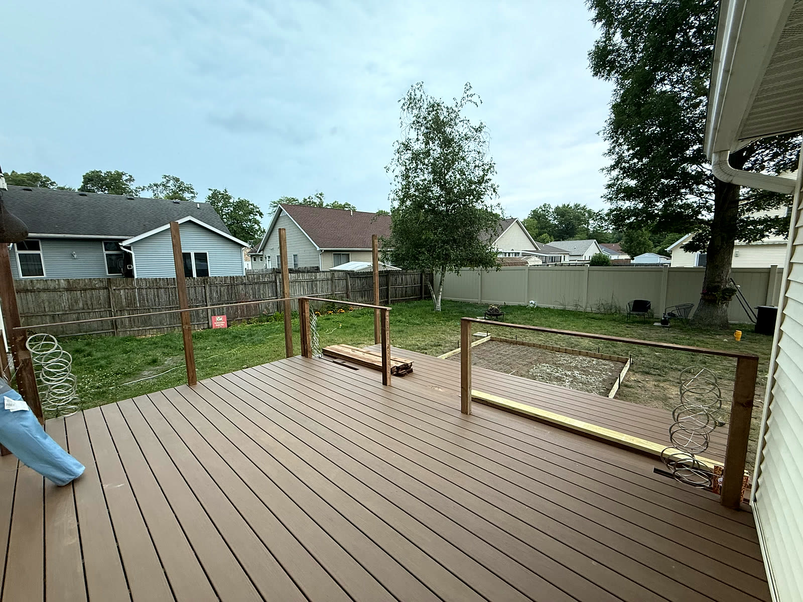 Composite deck boards and railing installed