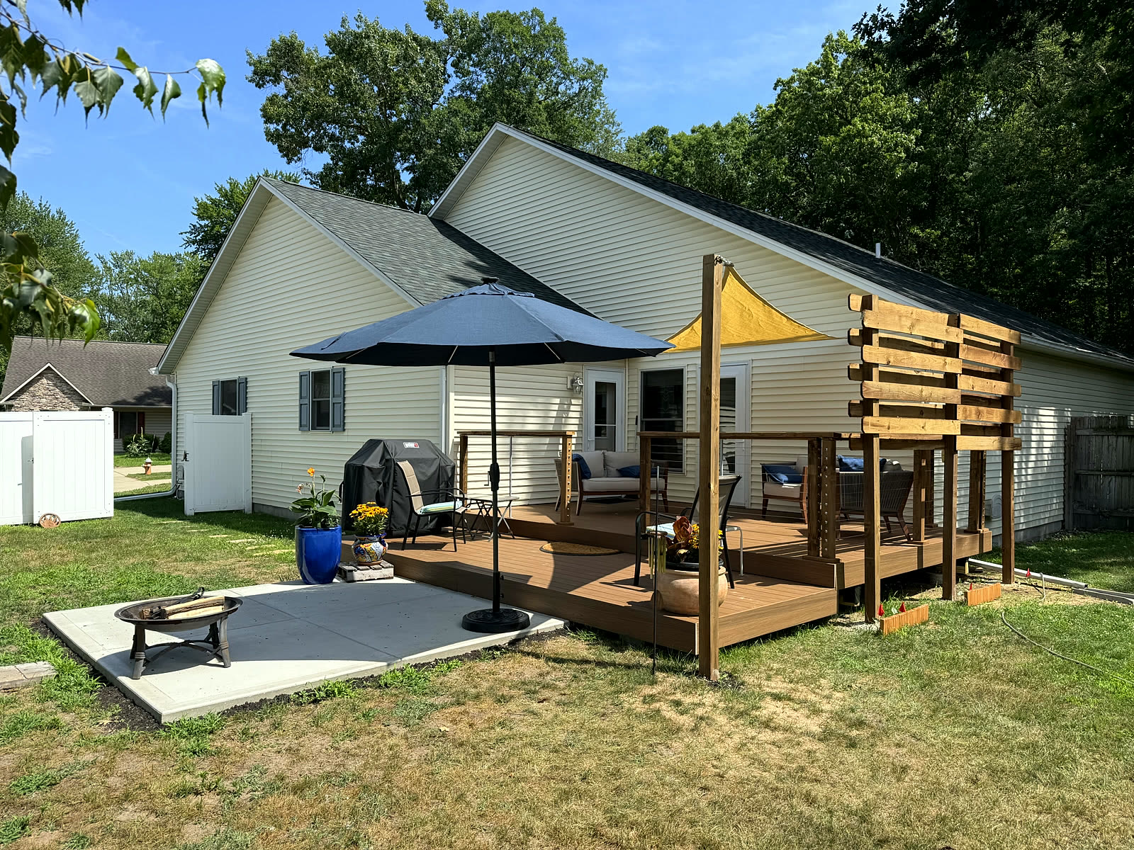 Composite deck and patio from the yard