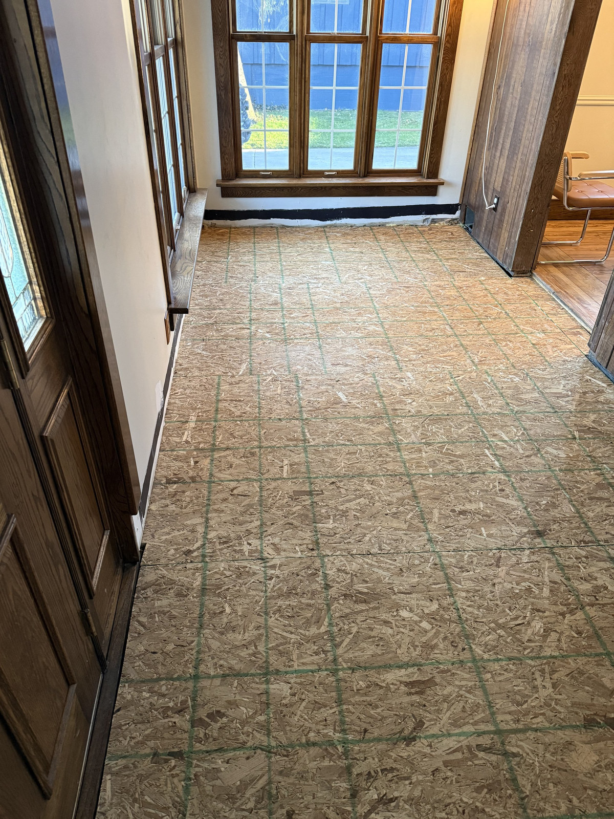 Same room with a new level subfloor ready for finish flooring